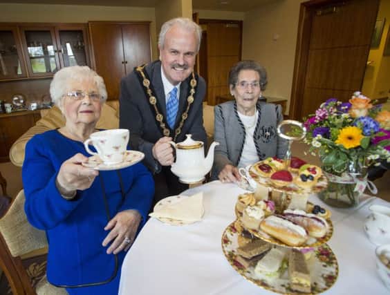 Mayor, Councillor Thomas Beckett launching an Afternoon Tea Party to be held on Monday 6th June in Lagan Valley Island, with Peggy Flynn and Elizabeth Hanna, as part of the Council's 90th Birthday Celebrations.  The event is open to all residents who have or will celebrate a 90th birthday in 2016.