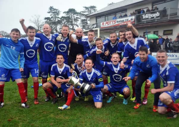Loughgall players celebrate the club's 12th Bob Radcliffe Cup triumph. Pics by PressEye Ltd.