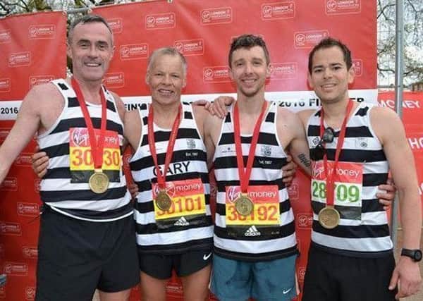 Members of East Antrim Harriers at last month's London Marathon.  INLT 19-903-CON