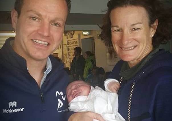 Bosco McShane, his newborn daughter Erin Rose, and Irish champion athlete Sonia O'Sullivan