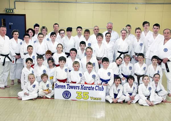 Chief instructor Dan Remond pictured with Seven Towers Karate Club members in the Leisure Centre, who are celebrating their 35th anniversary this month. See report on page ???????? INBT 19-801H