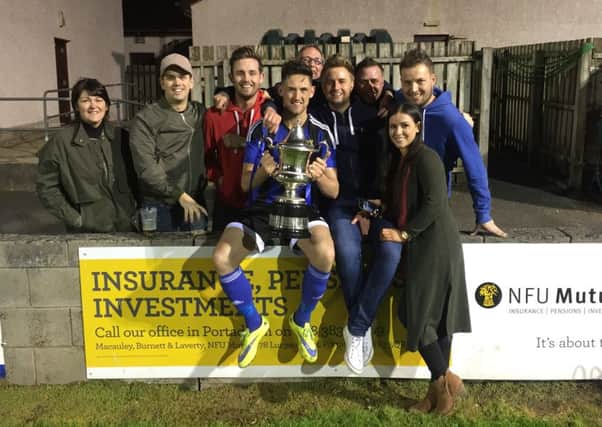 Tandragee-born Jordan Bell with some friends and supporters following Armagh City's success in the Bob Radcliffe Cup final on a penalty shoot-out victory against Loughgall.