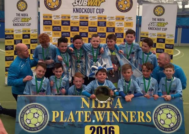 Ballymena United under-11s celebrate their NIBFA Plate success this morning.