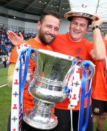 Jonny Tuffey and Glenavon Assistant Manager Paul Millar get to grips with the Cup at Windsor Park. Picture by Brian Little/Presseye
