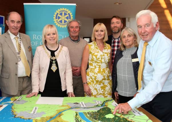 Pictured with the Mountsandel Model at the Cloonavin are from left; Liam Hickey, Rotary Club of Coleraine president, Councillor Michelle Knight-McQuillan, Mayor, Prof. Peter Woodman, Ireland's First Settlers book author, Kathy Mackenzie, Rotary Club of Coleraine treasurer, Robert Aiken, Rotary Club of Coleraine, Sue MacLaughlin, Rotary Club of Coleraine president elect, and Wes Armstrong, Rotary Club of Coleraine past district governor and model maker. INCR18-319PL