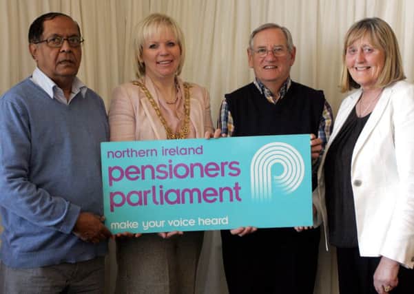 Mayor of Causeway Coast & Glens, Cllr Michelle Knight-McQuillan with pensioners Naresh Jairath and Ross Bailie and Thelma Dillon from Age Sector Platform
