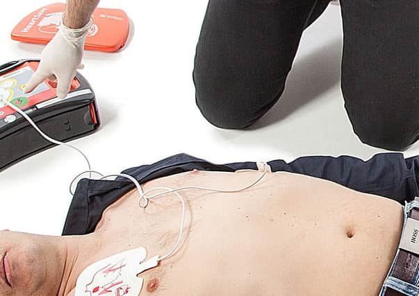 A scene showing how AED (automated external defibrillator) works.