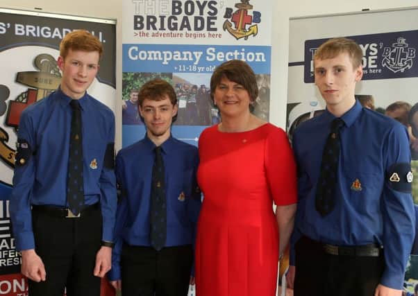 First Minister Arlene Foster MLA who was guest of honour at Friday evening's Queen's Badge Celebration in Wellington Presbyterian Church is seen here with local BB members who received awards. L-R, Philip Brown of 1st Cloughwater, Jude White of 3rd Ballymena and Lee Dempster 3rd Ballymena. INBT 20-105JC