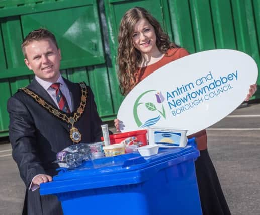 Mayor of Antrim and Newtownabbey, Councillor Thomas Hogg is joined by Environmental Awareness Officer, Leona Donaghy to promote the new materials that can now be recycled in your blue bin.