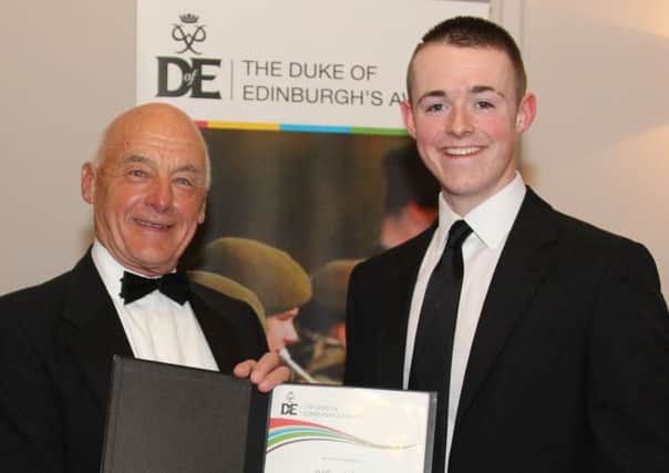 Representing the Portadown Detachment Army Cadet Force at the event was Cadet Sergeant William Robinson from the town, pictured (Ref 3925A) receiving a certificate to mark his participation from Colonel Mike Gerrish MBE of the Army Cadet Force Association Duke of Edinburgh Advisory Panel.