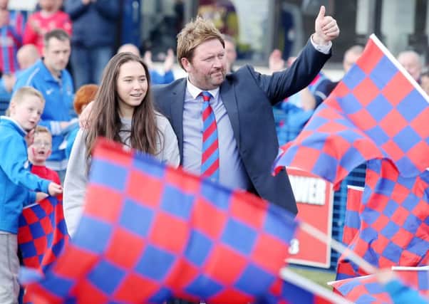 Portadown-born Niall Currie with eldest daughter Lauren during celebrations to mark Ards' Championship title triumph. Pic by PressEye Ltd.