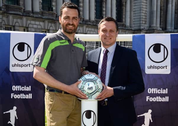Paul Sherratt, Country Manager of uhlsport Uk and Ireland, alongside Andrew Johnston, NI Football League Managing Director with the new matchball for the 2016/17 season. INLT 20-901-CON