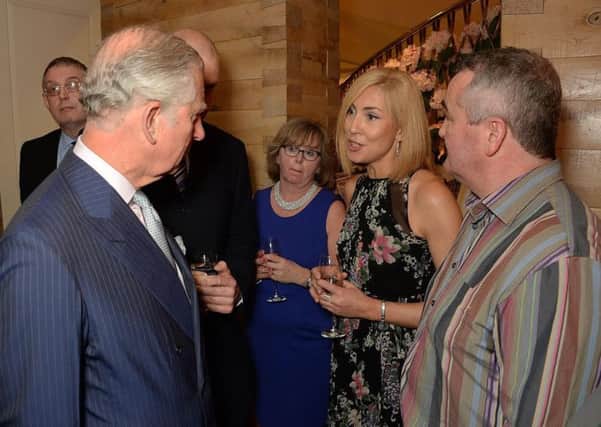 Cathy Chauhan from Lough Neagh Fishermen's Co-op meets Prince Charles at Fortnum & Mason in London