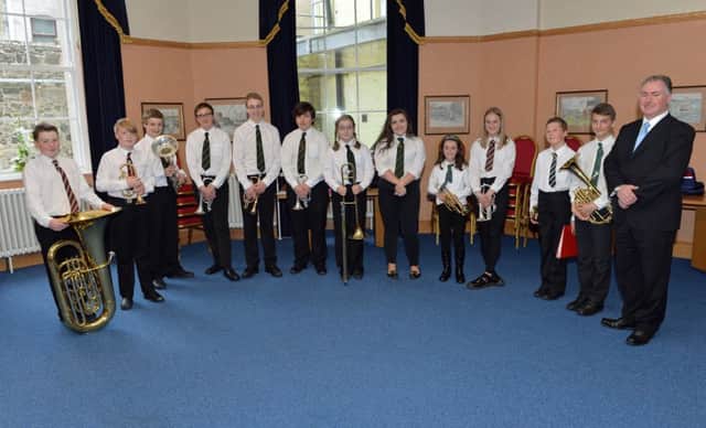 Junior members of CWA Brass Band with conductor Robin Clinton. INCT 17-011-PSB