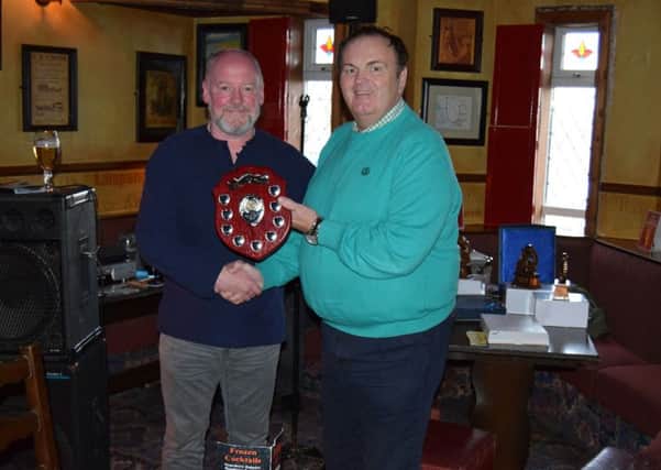 Nick Rusk (left) finished as inaugural Mid-Ulster tournament champion thanks to success in Cookstown. Making the presentation is George Booth (tournament sponsor, The Railway Bar).