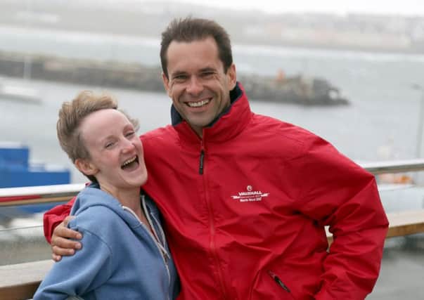 Violet McAfee, the spectator seriously injured in a crash at the 2015 North West 200, meets Horst Saiger, the Austrian rider whose Kawasaki machine collided with her as she watched the racing from a garden in Portstewart. PICTURE BY STEPHEN DAVISON