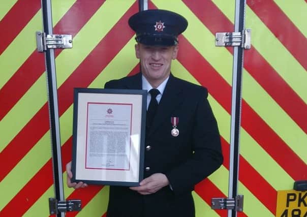 Barry with a commendation for his work on a crash in Draperstown