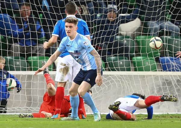 Paddy McNally celebrates scoring for Ballymena United against Linfield during the County Antrim Shield final. The defender is one of three departures from the Showgrounds.