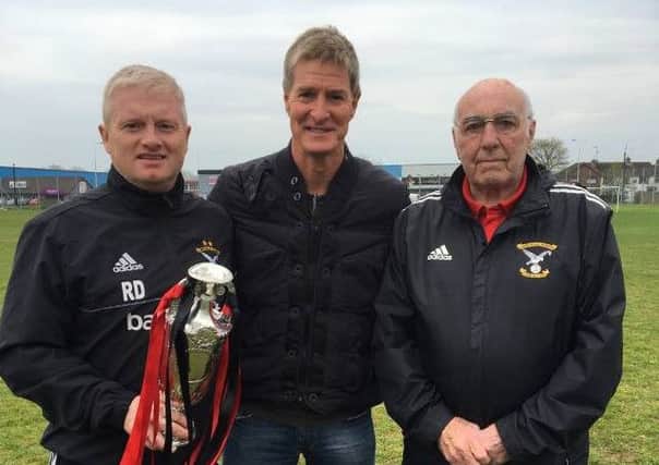 Former Rangers and Scotland captain Richard Gough, pictured with Harryville Homers manager Robert Duddy and club President Jim McLaughlin on his recent trip to Ballymena.