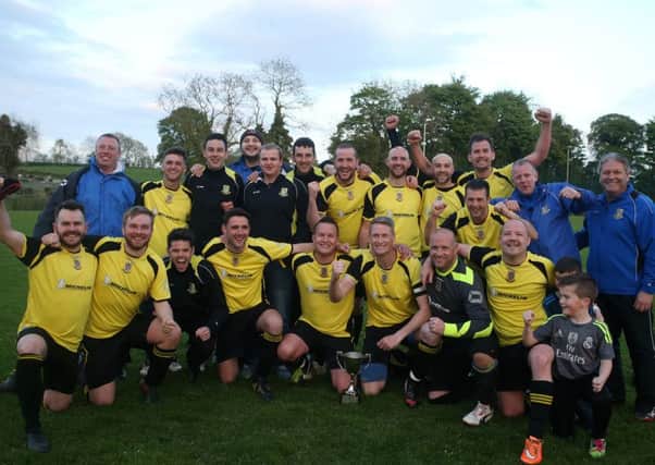 Michelin celebrate their 2-0 win over Ahoghill Rovers in Friday evening's George McAuley Cup final in Kells. See page 45 for the latest news from the Ballymena Saturday Morning League. INBT 20-171CS