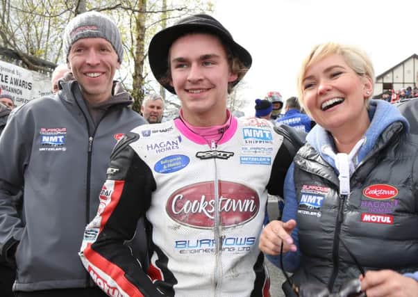 Cookstown B.E. Racing team owner John Burrows (left) with wife Rachel and Malachi Mitchell-Thomas at the Cookstown 100 in April.
