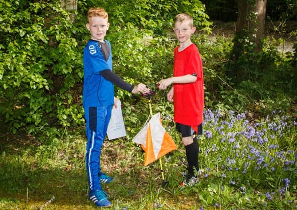 Rian Carl and Ryan Corrigan enjoying the Aspire Sport Orienteering Programme at Antrim Castle Gardens