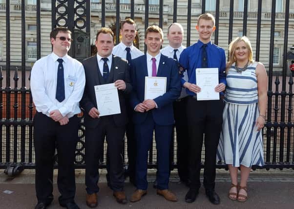 Darren Hamill (front row, second from left), pictured with colleagues who also received their Gold Duke of Edinburghs Award at a special Diamond Celebration at Buckingham Palace.