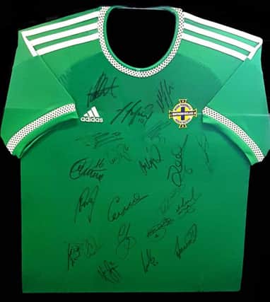 Supporters of the Northern Ireland Soccer team - and anyone else who is keen on a piece of valuable memorabilia - are being given a chance to bid for a framed Northern Ireland Senior Team Shirt, signed by the UEFA Euros 2016 team themselves.