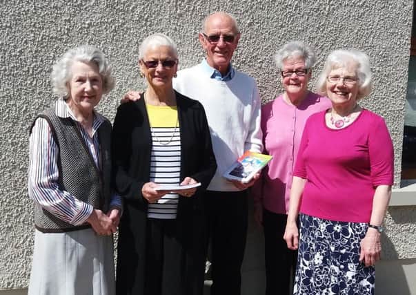 (From left) Irene Cumming, Ballymena Festival President, pictured with Agnes and Fred Alexander, Isobel Petticrew (former Trophy Secretary) and Joyce Coulter (Festival vice-chairman). (Submitted Picture).