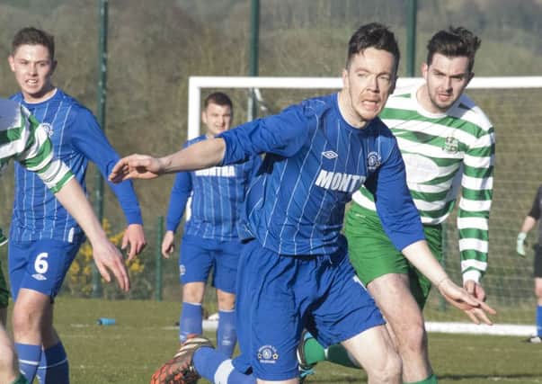 Johnny Gaile in action in the 4-1 semi final win over Draperstown Celtic. PIC: Zack McConnell