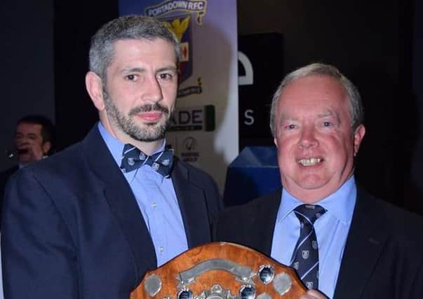 Diarmaid O'Kane (left) finished with two awards at the Portadown end-of-season dinner. Also included is club president Ian Wray. Pic by Matthew Wickham.