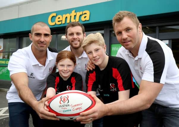 Ulster Rugby stars Darren Cave, Roger Wilson and Ruan Pienaar help young players Nathan and Abi Toland kick off the 2016 Centra Ulster Rugby Summer Camps.