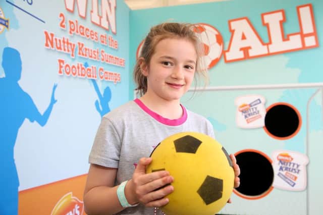 Olivia Woodside (8) from Islandmagee taking part in the football event at the Balmoral Show.  INCT 20-709-CON