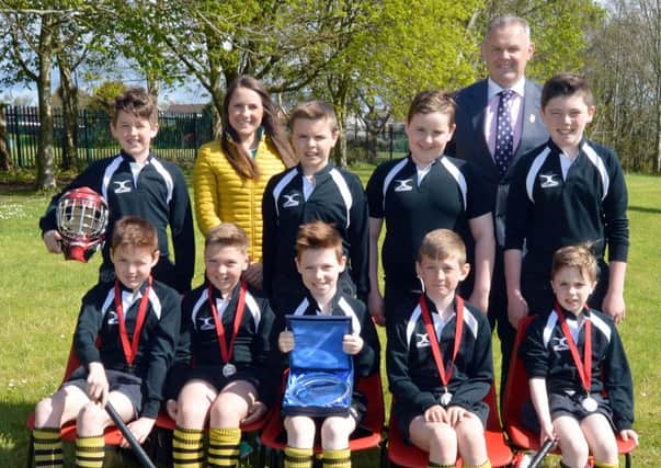 Edenderry Primary School boys with Stephen Doyle (school principal) and Lesley Hanna (coach) following runners-up at the Northern Ireland Championships.INPT18-200