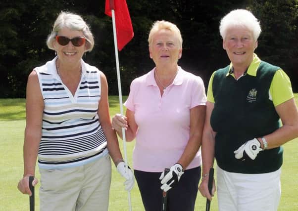 Lesley Harkness, Maureen McRory and Eileen Maginess during Manchester Cup play at Tandragee.