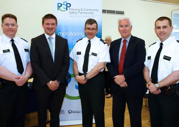 Deputy Chief Constable Drew Harris with (l-r) Chief Inspector Derek McCamley; Councillor Scott Carson, Chairman Lisburn and Castlereagh PCSP; Mr Adrian Donaldson, Director of Corporate Services, Lisburn and Castlereagh City Council and Chief Inspector John Wilson.