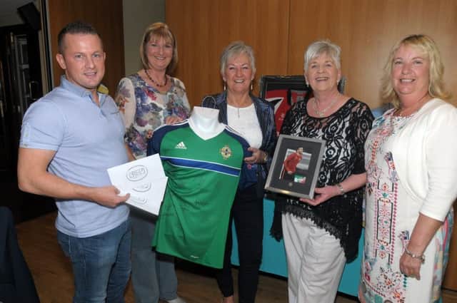 Stuart and Sandra Hewitt from Creed Coffee House in Carrick present Jacqueline Stewart, principal,  Gwen Robb, former chair of the PTA and Diane Sloan with vouchers and prizes for the quiz. INCT 19-222-AM