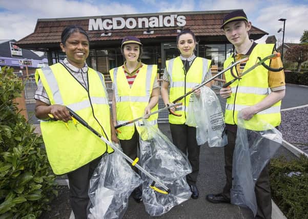 Staff from McDonald's, Glengormley taking part in the Big Spring Clean. INNT 21-800CON
