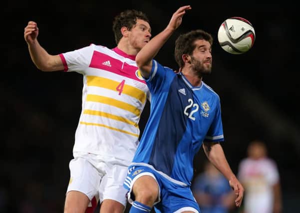 Northern Ireland's Will Grigg (right) in action against Scotland in March last year