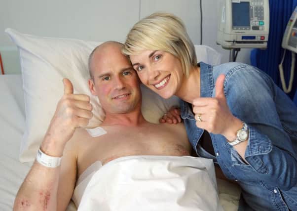 Ryan Farquhar with his wife Karen by his bedside as he recovers from his North West 200 race crash injuries in the Royal Victoria Hospital, Belfast. 
PICTURE BY STEPHEN DAVISON\PACEMAKER.
