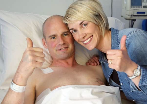 18/5/2016: Ryan Farquhar with his wife Karen by his bedside