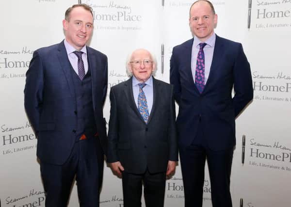 Mid Ulster Council chair Cathal Mallaghan and Chief Executive Anthony Tohill with Irish President Michael D Higgins at an event promoting Seamus Heaney's HomePlace at the Royal Irish Academy in Dublin