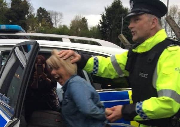 Police 'arrest' Tracy Collings for talking too much