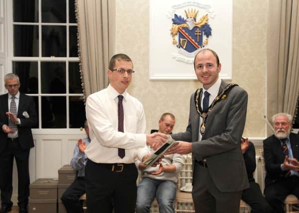 Lord Mayor of Armagh City, Banbridge and Craigavon Borough Council
pictured being presented with the first copy of 170 years History of Lurgan Show by John Harrison