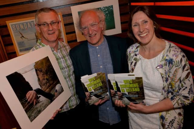 Â©Stephen Wilson Photography - 17th May 2016
Artist and outdoor swimmer Neil Shawcross with authors Maureen McCoy and Paul McCambridge at the launch of their book, Wild Swimming in Ireland held at the Cardan Bar and Grill, Lisburn.

The Irish have a deep affinity with the water and are
spoiled by some of the most beautiful outdoor
swimming spots in the world. Maureen McCoy and
Paul McCambridge, both from County Down, can
personally attest to the joy of taking the plunge in
Irelands waters. Theyre both keen wild swimmers 
Maureen always keeps a swimsuit in her car and Paul
sees swimming outdoors as therapy for a busy lifestyle. Together they
travelled the country to discover the 50 best places to
swim in rivers, lakes and the sea that are featured in
their new book Wild Swimming in Ireland.