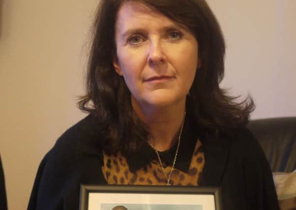 Catherine McBennett, founding member of the Niamh Louise Foundation, with a photo of her daughter, Niamh, who died by suicide 10 years ago