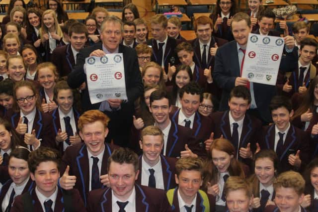 Headmaster of Dalriada School Tom Skelton, Events advisor for Dalriada School John Cartwright and pupils from year 11 will be rolling out a warm welcome to keen record breakers on May 28th. inbm22-16s
