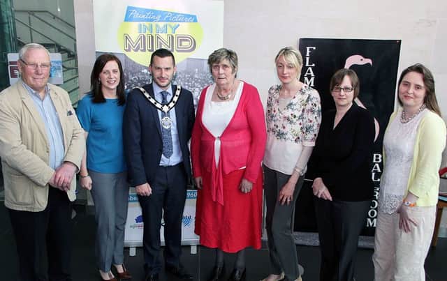 The Deputy Mayor with the Chairperson and staff from Mid and East Antrim Agewell Partnership, a representative from the Northern Ireland Museums Council (part funders) and Mid-Antrim Museum staff. INBT 23- DEMENTIA WEEK 1.