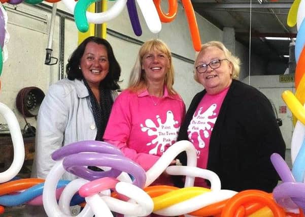 Lisa Bailie (centre) with Paula Bradley MLA (left) and Ann Boal from Whiteabbey Action Cancer Group. INNT 21-511CON
