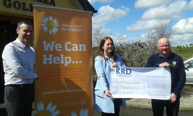 Pictured is Joe and Brian McGill from Kilrea GC presenting Naomi Braithwaite from Cancer For Children with a cheque for Â£5080.